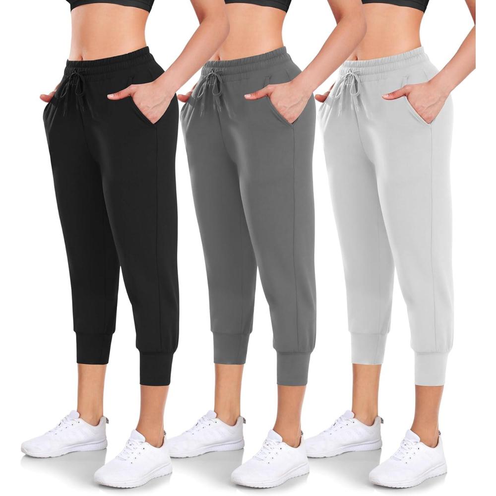 imageWomens 3 Pack Capri Sweatpants with Pockets  HighWaist Yoga Joggers Athletic Running Leggings for Workout Gym LoungeBlackGreyLight Grey