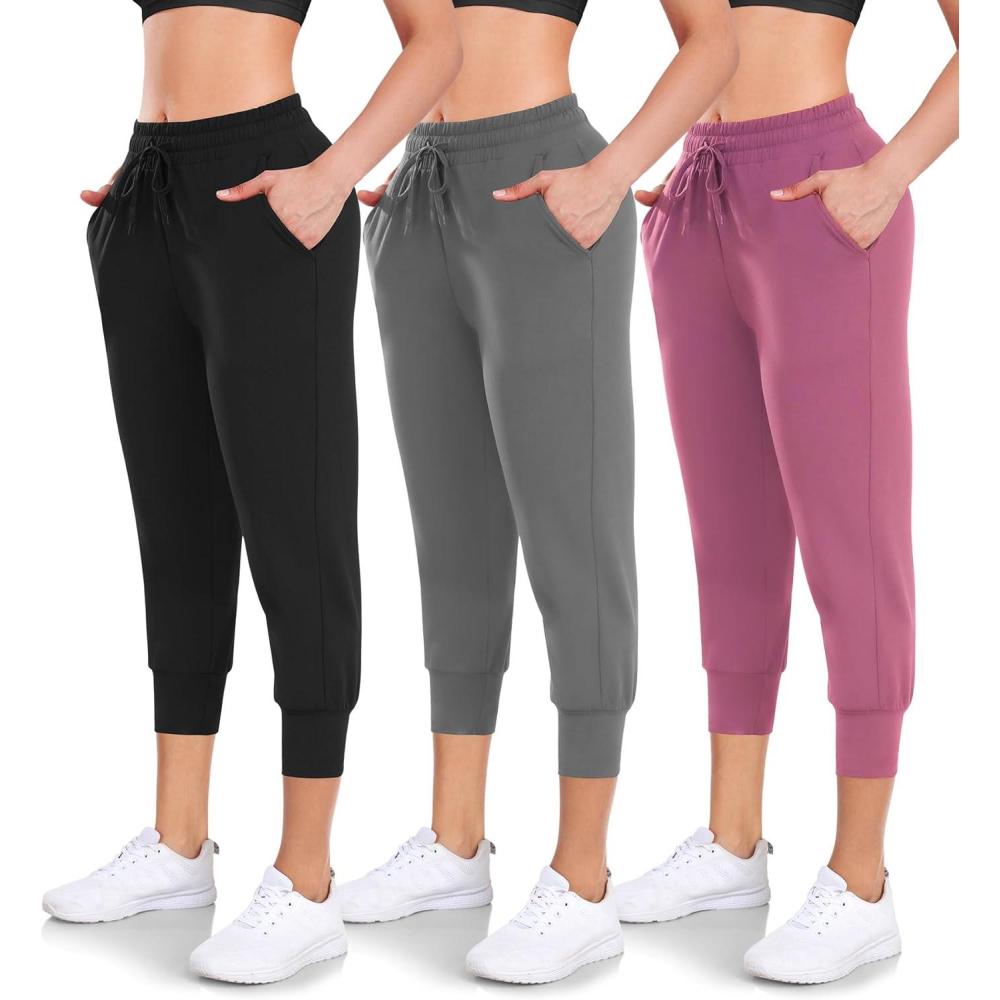 imageWomens 3 Pack Capri Sweatpants with Pockets  HighWaist Yoga Joggers Athletic Running Leggings for Workout Gym LoungeBlackGreyPink